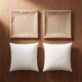 Two beige corduroy 18x18 pillow covers and two white pillow inserts, flat lay on walnut